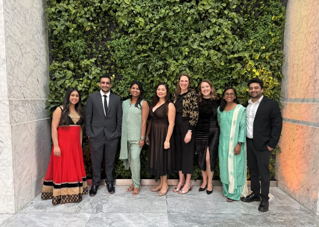 Team members posing at the South Asian Bar Association Gala.