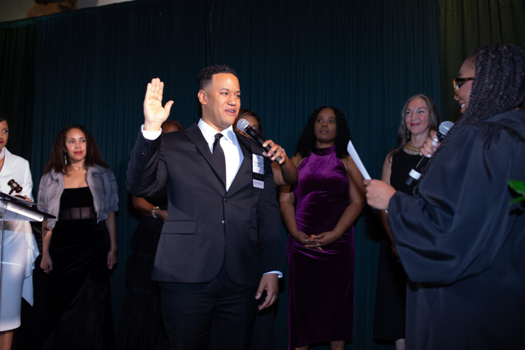 Team members posing at the Thurgood Marshall Bar Association Gala.